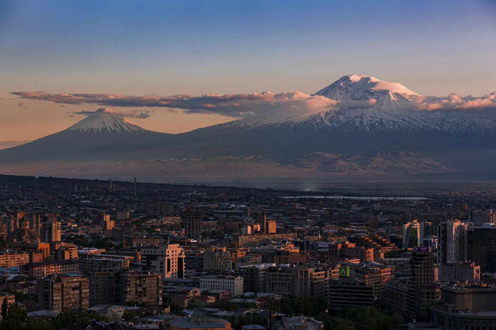 Yerevan at sunset with Mount Ararat behind the city